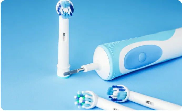 Electric toothbrushes and replacement brush heads