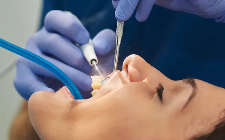 A patient having a deep cleaning at the dentist